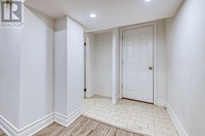 Newmarket (Bristol-London) apartment for rent - A white door is in a white room with white walls.