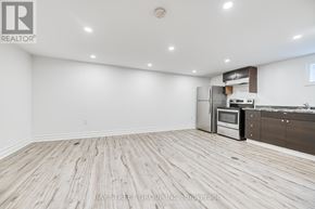 Newmarket (Bristol-London) apartment for rent - A spacious kitchen with wooden flooring and modern appliances.