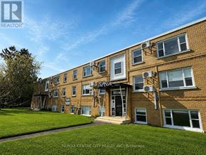 St. Thomas condo for rent - A building with a lawn in front of it.
