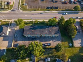 St. Thomas condo for rent - An aerial view of a parking lot with a building in the center.