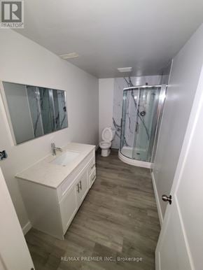 Orillia townhouse for rent - A white bathroom with a walk in shower.