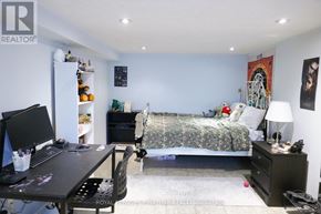 Toronto (Dovercourt-Wallace Emerson-Junction) apartment for rent - A bedroom with a bed, desk, and chair.