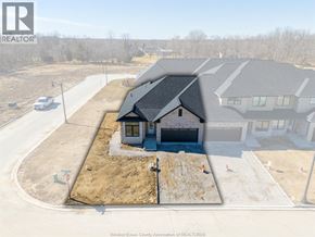 Amherstburg townhouse for rent - A house under construction with a REALTOR® logo on the top left.