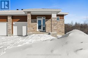 Brockville apartment for rent - A house with a large mound of snow in front of it.