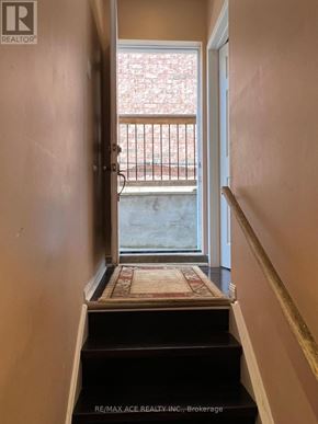 Markham (Wismer) apartment for rent - A hallway with a door leading to a balcony.