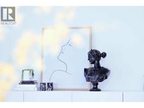 Vancouver apartment for rent - A bust of a woman is displayed on a white shelf.