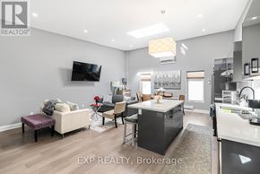 Niagara Falls (Dorchester) apartment for rent - A modern kitchen with a dining table and chairs.