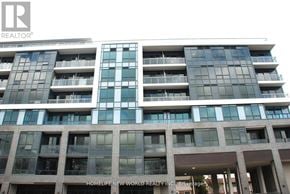 Hamilton (Kirkendall) condo for rent - A modern building with a glass facade and a sign that reads "HOMELIFE NEW WORLD REALTY INC Brokerage".