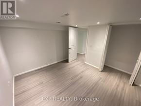 Orillia duplex for rent - A room with EXP REALTY, Brokerage written on the floor.