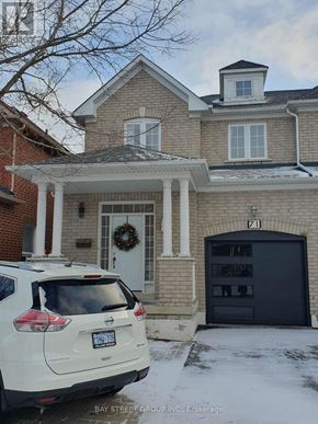 Markham (Village Green-South Unionville) apartment for rent - A house with a porch decorated with Christmas lights.