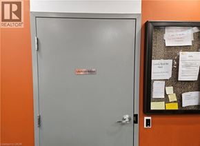 Hamilton condo for rent - A door with a sign that says "Laundry Room" on it.