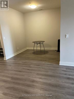 Hamilton (Central) condo for rent - A room with a table and chairs in it.