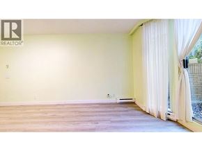 Vancouver apartment for rent - A room with a window and a curtain.
