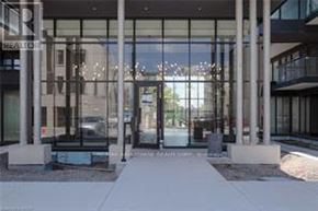 Burlington (Lasalle) condo for rent - The image shows the front of a real estate office with a glass door and a walkway leading to it.