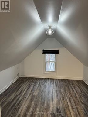 Hamilton (Crown Point) apartment for rent - A room with wooden flooring and a window.