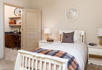 Built-in home office with overhead shelving in select homes