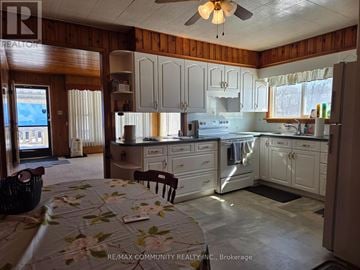 Clarington (Bowmanville) apartment for rent - A kitchen with a table and chairs in it.