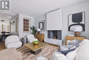 Toronto (Annex) apartment for rent - A living room with a white couch and a coffee table.