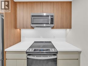Windsor apartment for rent - A kitchen with a microwave above the stove.