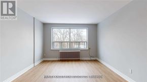 Toronto (Keelesdale-Eglinton West) apartment for rent - A room with a window and a radiator on the floor.