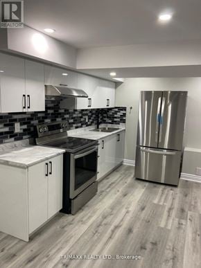 Caledon apartment for rent - A kitchen with a refrigerator, stove, and oven.