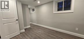 Kitchener apartment for rent - A room with a door and a window.