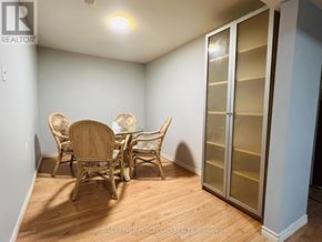 Hamilton (Westcliffe) apartment for rent - A room with a table and chairs in it.