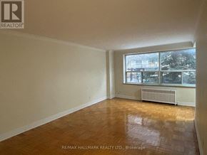 Toronto (Yonge-St. Clair) house for rent - A room with a window and a radiator on the floor.