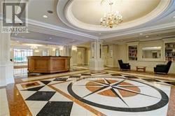 Toronto (Bay Street Corridor) condo for rent - A large, fancy room with a wooden table and a chandelier.