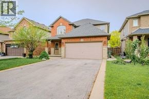 Hamilton apartment for rent - A large house with a garage is for sale.