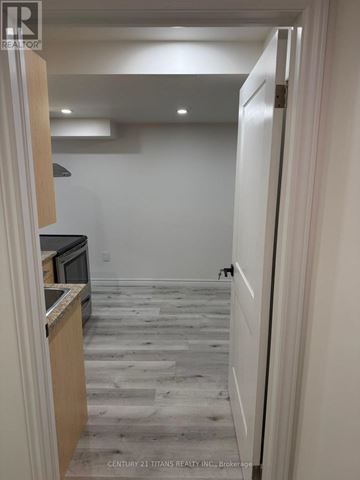 Whitby (Williamsburg) apartment for rent - A kitchen with a microwave and a refrigerator.
