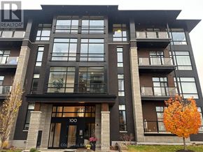 Ottawa condo for rent - A modern apartment building with the number 100 on the front door.
