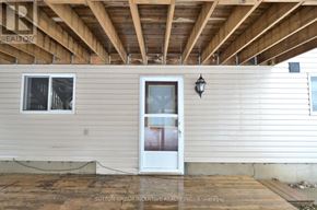 Barrie (Grove East) apartment for rent - A house with a white door and a window is for sale.