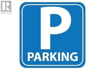 Toronto (Waterfront Communities) condo for rent - A blue and white parking sign with a white letter P on it.