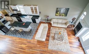 Niagara Falls (Forestview) apartment for rent - A living room with a white couch and a coffee table.
