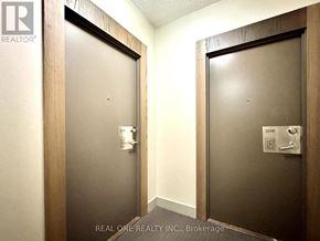 Mississauga (City Centre) condo for rent - Two doors with Real One Realty Inc. logo on them.
