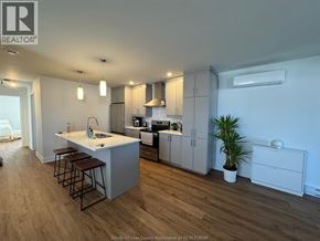 Rockland apartment for rent - A kitchen with a white countertop and wooden floors.