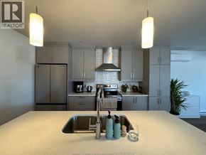 Rockland apartment for rent - A kitchen with a sink and a stove top oven.