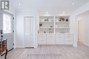 Cobourg apartment for rent - A white room with shelves and drawers.