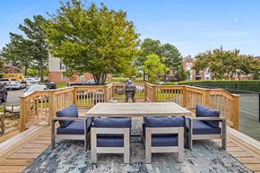 Cordova townhouse for rent - Outdoor grill and picnic area with cozy seating on a sunny day at Cordova apartments for rent