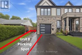 Mississauga (Streetsville) condo for rent - A house with a sign that says Unit B Parking Spot.