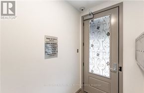 Hamilton (Landsdale) multi-family for rent - A door with a glass window and a sign on the wall.