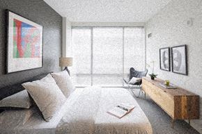 Boston apartment for rent - a bedroom with a bed and a desk