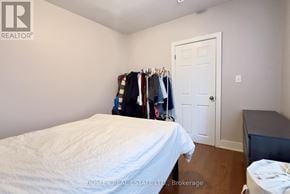 Toronto (Cabbagetown-South St. James Town) townhouse for rent - A room with a white door and a white radiator on the floor.