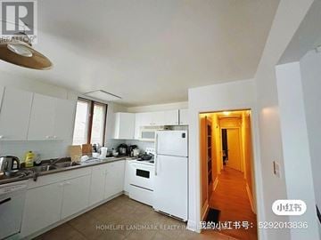 Hamilton (Ainslie Wood) apartment for rent - A white kitchen with a refrigerator, sink, and stove.
