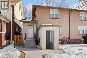 Windsor apartment for rent - A small house with a white door and a grey roof.