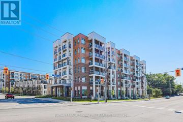 Toronto (Beechborough-Greenbrook) condo for rent - A multi-story building with a clear blue sky in the background.