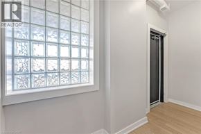 Hamilton apartment for rent - A room with a window and a door.
