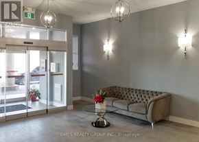 Peterborough (Ashburnham Ward 4) condo for rent - A waiting area with a couch, chairs, and a coffee table.