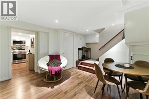 Hamilton apartment for rent - A living room with a couch, chairs, and a dining table.